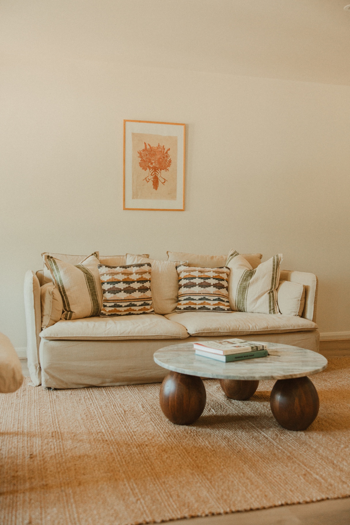 The Guesthouse - linen sofa with kilim cushions and marble coffee table