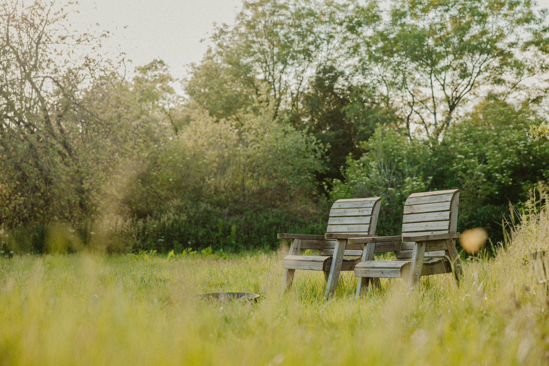 Willow - fire pit and chairs with wool blankets in the meadow