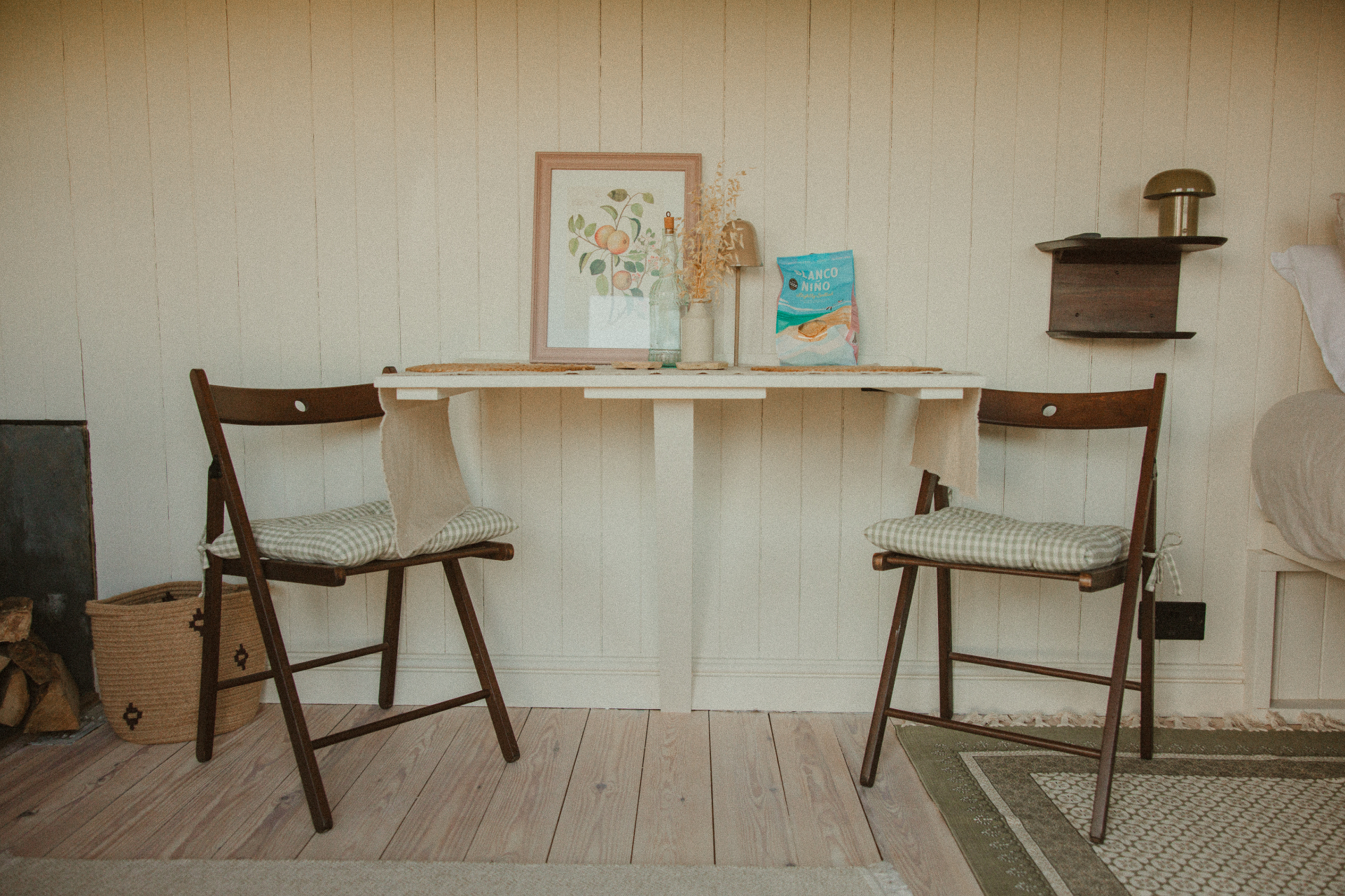 Willow - small dining table with botanical print and folding chairs